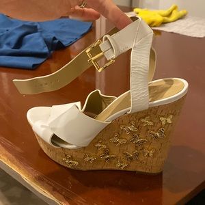 Michael Kors set of wedges and wrist purse.